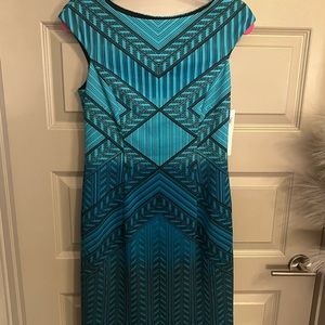Women’s teal and black dress. Size 6. New with tags.